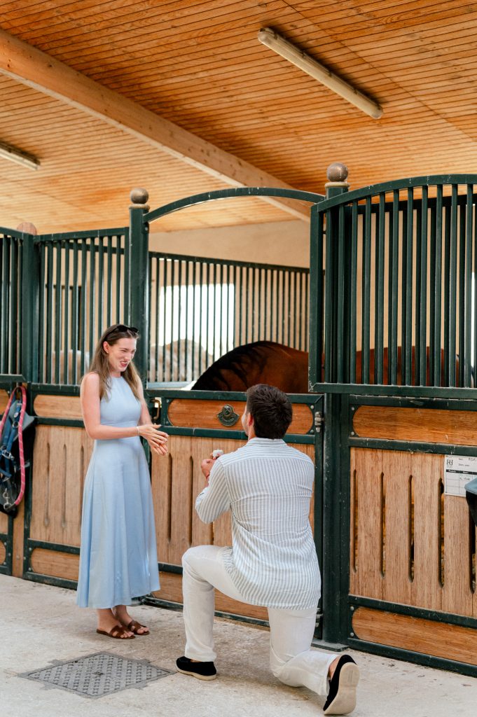 "Man proposing to his partner in a private stable in Cassis, Provence.