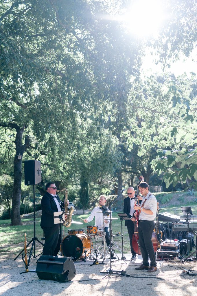 band playing during an intimate american destination wedding at la deveze, gard