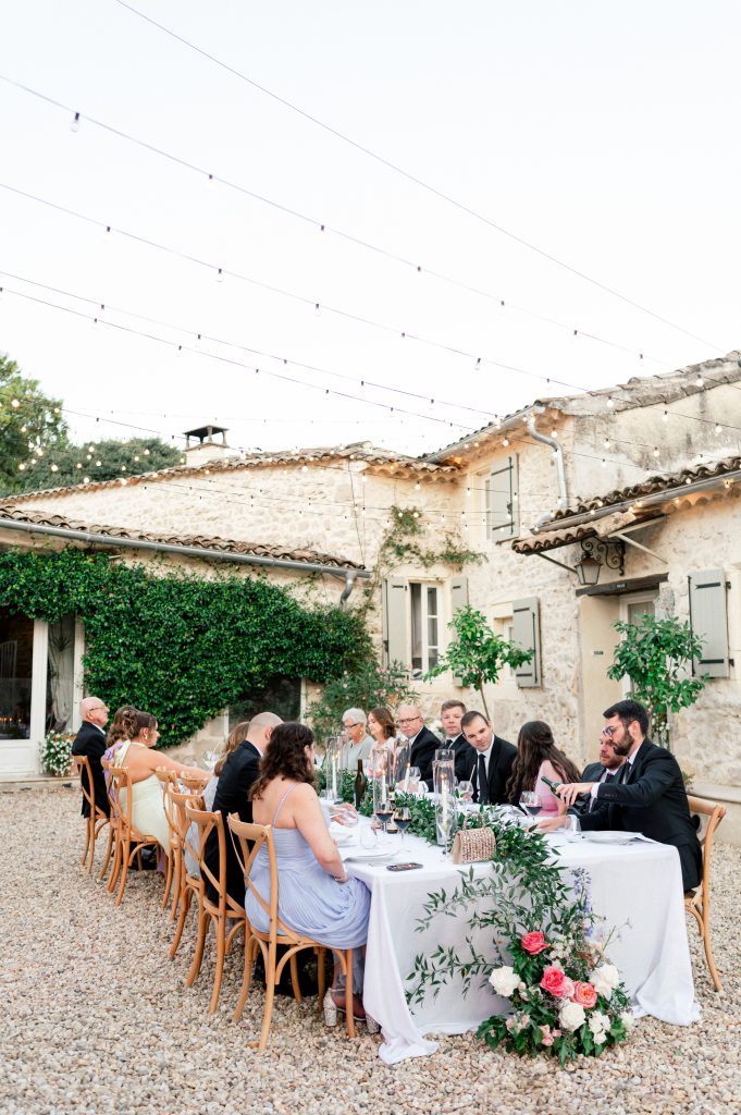 american couple eating dinner during their intimate wedding in la deveze south of france